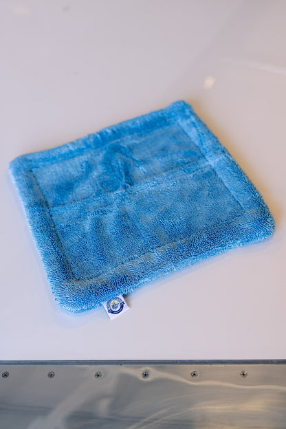 Blue AeroWipe Mini microfiber drying towel folded on white surface for aviation, auto, and marine detailing tasks